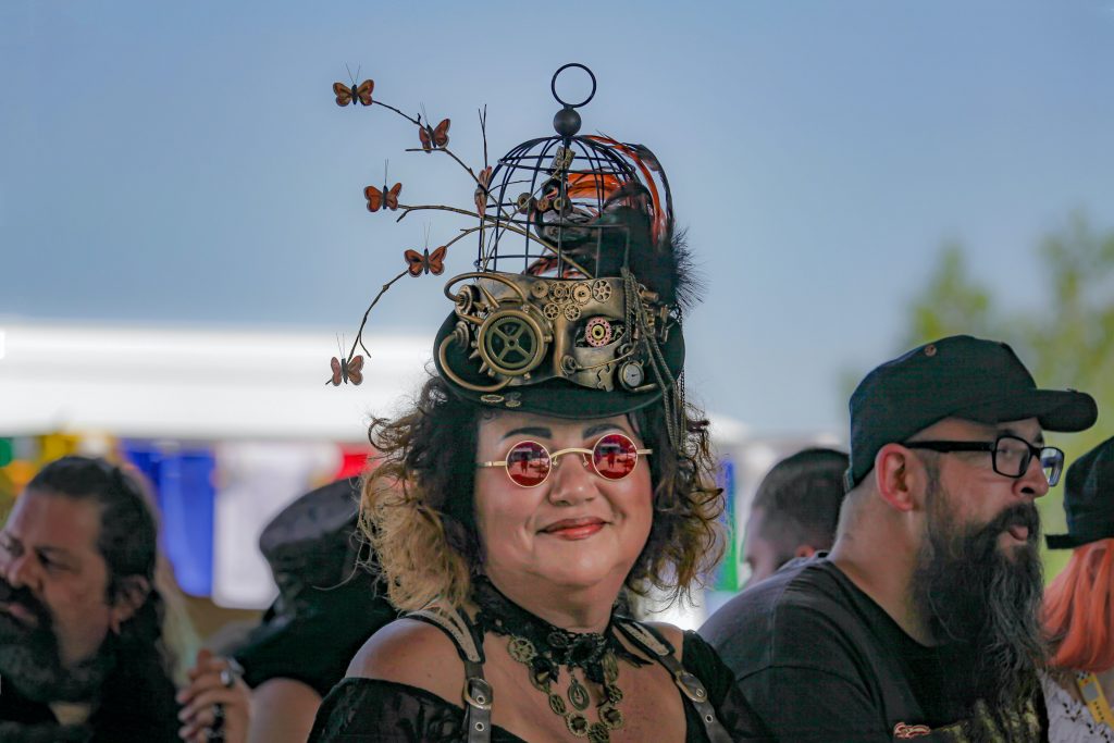 steampunk woman middle-aged with birdcage hat